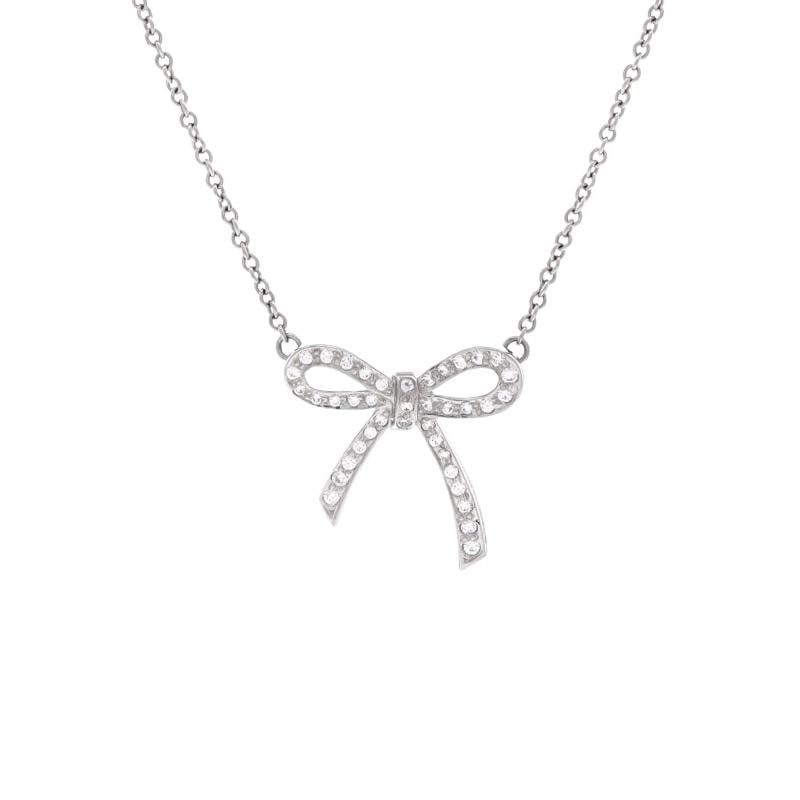 Tiffany & Co. Bow Pendant Necklace Platinum and Diamonds Mini: Measurements: Length: 16.00 ", Pendant Length: 14.75 mm, Pendant Width: 15.05 mm Condition: Pre-owned - Good,Brand: Tiffany & Co.,Main Stone: Diamond,Metal: 18K Rose Gold,Metal Purity: Unknown,Style: 
