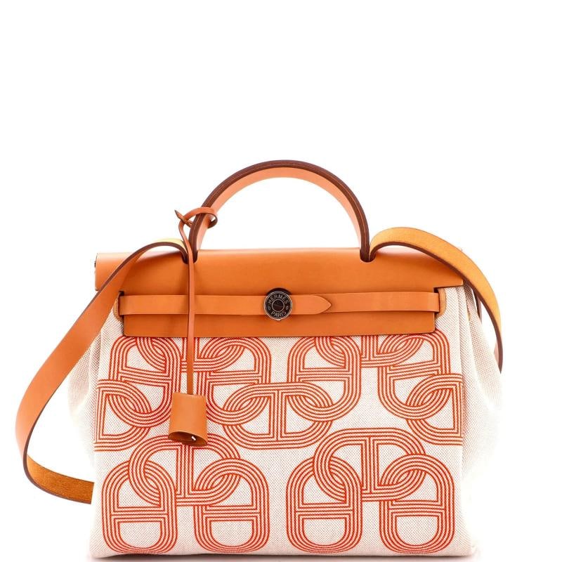 Hermes Herbag Zip Circuit 24 Vache Hunter and Leather 31: Condition: Pre-owned - Good,Brand: Hermes,Exterior Material: Canvas Plain, Leather,Style: Top Handle,Exterior Color: Orange,Department: Women,Size: 31,Accessories: Keys, Pochette, Clochette