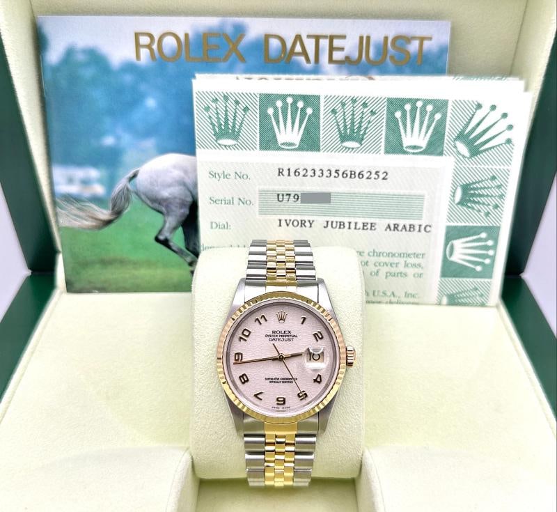 Rolex Datejust 16233 36mm Ivory Jubilee Arabic Dial 18K Gold Steel Box Papers: Condition: Pre-owned - Excellent,Bezel Color: Gold, Yellow,Indices: Arabic Numerals,Year Manufactured: 2000-2009,Band/Strap: Rolex Jubilee,Case Color: Silver,Department: Men,Bezel Type: Fluted,Watch