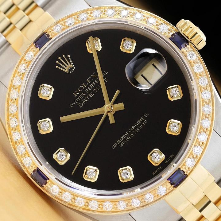 ROLEX DATEJUST 16233 BLACK FACTORY DIAMOND SAPPHIRE 18K GOLD STEEL WATCH: This is an authentic Rolex Datejust 16233 watch with two tone 18K yellow gold and stainless steel jubilee bracelet, factory Rolex diamond dial Ref., and custom 18K yellow gold sapphire diamond bezel. 