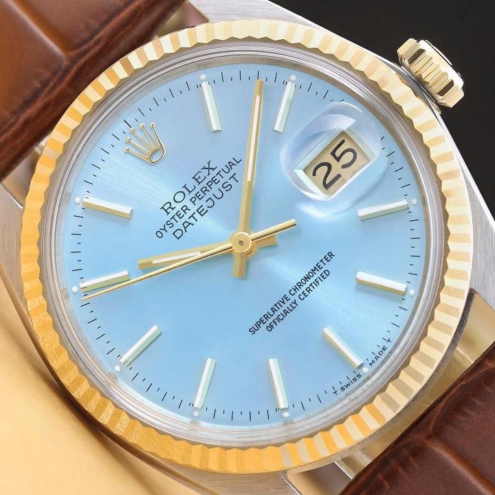 ROLEX DATEJUST 16013 18K GOLD STEEL ICE BLUE DIAL WATCH w/ BROWN LEATHER STRAP: Condition: Pre-owned - Excellent,Bezel Color: Gold,Max Wrist Size: 7.26-7.5 in,Number of Jewels: 27 Jewels,Indices: Stick Indexes, 12-Hour Dial,Bezel: Rolex 18K Yellow Gold Fluted Bezel,Band/Strap: Br
