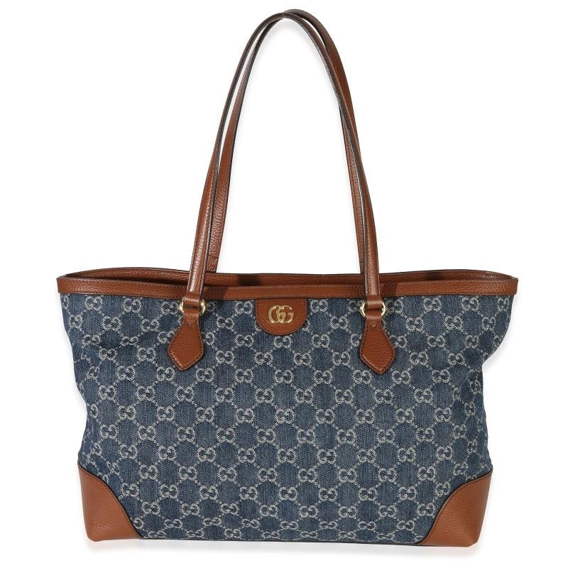 Gucci Blue New Denim GG Monogram Dollar Calfskin Medium Ophidia Shopping Tote: Condition: Pre-owned - Good,Dimensions: 14 x 10 x 5.25,Handbag Accessories: None,Bag Width: 14 in,Bag Depth: 5.25 in,Bag Height: 10 in,Department: Unisex,Style: Tote,Material: Leather;Denim,Color: Blu