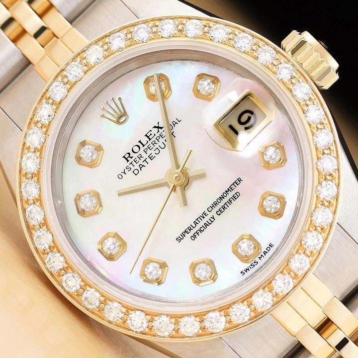 ROLEX LADIES DATEJUST 69173 MOTHER OF PEARL DIAL 18K GOLD STEEL DIAMOND WATCH: Condition: Pre-owned - Excellent,Bezel Color: Gold,Max Wrist Size: 6.26-6.75 in,Number of Jewels: 29 Jewels,Indices: Diamond Markers, 12-Hour Dial,Band: Rolex Two-Tone Jubilee Bracelet,Bezel: Custom 1
