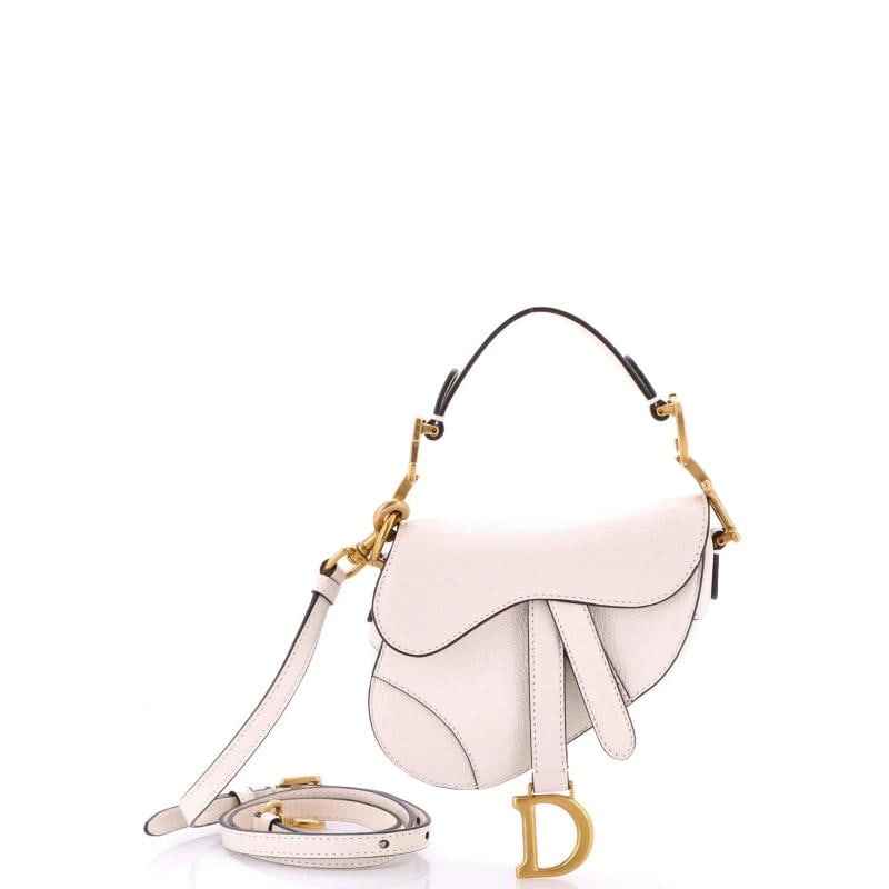 Christian Dior Saddle Handbag with Strap Leather Micro: Condition: Pre-owned - Excellent,Brand: Christian Dior,Exterior Material: Leather,Style: Shoulder Bags,Exterior Color: White,Department: Women,Size: Micro,Accessories: With Strap Condition: Great. Ext