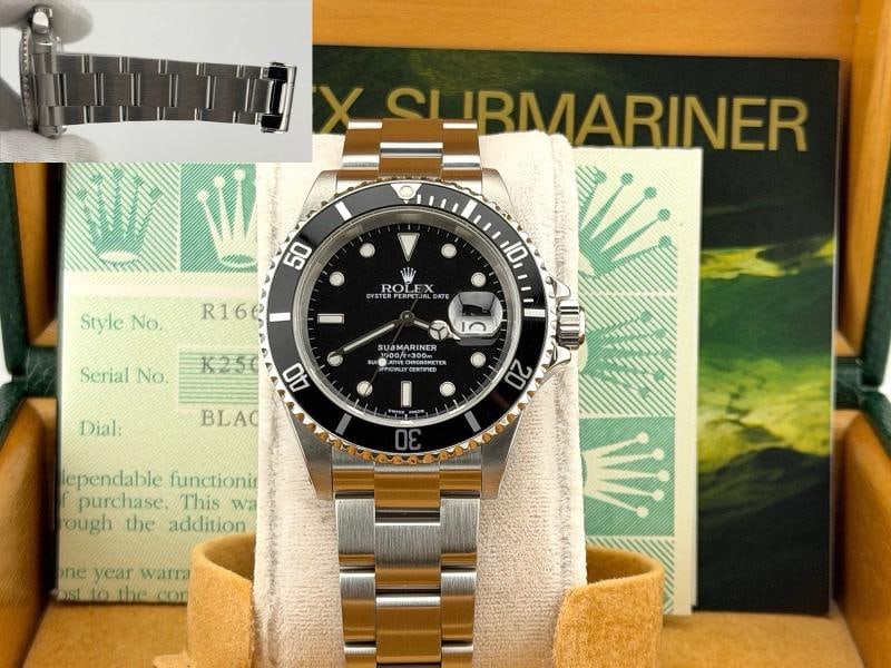 2003 Rolex Submariner Date 16610 40mm Black Dial Stainless Steel Box Papers: Style Number: 16610 Serial: K25**** Year: 2003 Model: Rolex Submariner Date Case Material: Stainless Steel Band: Stainless Steel Bezel: Black Dial: Black Crystal: Sapphire Case Size: 40mm Includes: - 
