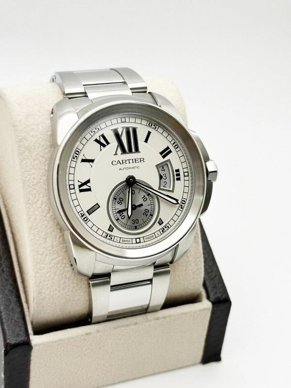 Cartier Cailbre Ref 3389 42mm Silver Dial Stainless Steel: Condition: Pre-owned - Good,Country of Origin: Switzerland,Bezel Color: Silver,Movement: Mechanical (Automatic),Seller Warranty: Yes,Indices: Roman Numerals,Reference Number: 3389,Band/Strap: Bracelet