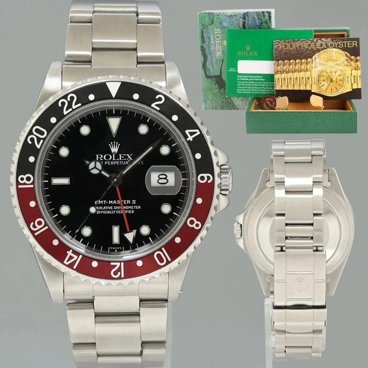 1999 Rolex GMT-Master II Coke Red Black Steel 16710 40mm Watch Box: Case & Dial Case Material: Rolex Stainless Steel Case Size: 40mm Bezel: Rolex Red and Black "Coke" Crystal: Rolex Sapphire Dial: Rolex Black "Swiss Only" Movement & Bracelet Movement: Rolex Automatic 