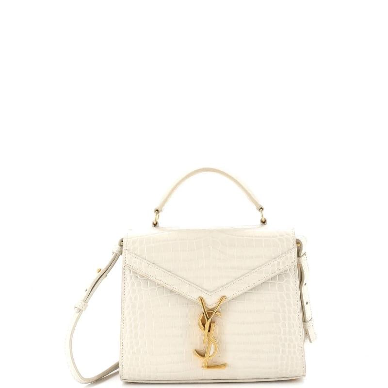 Saint Laurent Cassandra Top Handle Bag Crocodile Embossed Leather Mini: Condition: Pre-owned - Good,Brand: Saint Laurent,Exterior Material: Leather,Style: Shoulder Bags,Exterior Color: White,Department: Women,Size: Mini,Accessories: With Strap Condition: Very good.