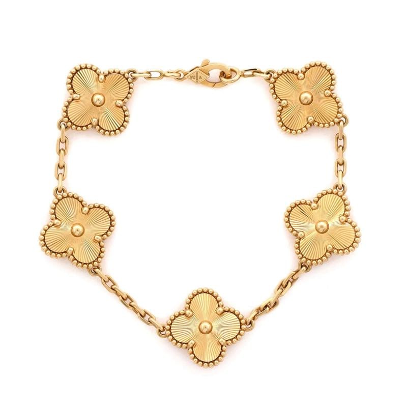 Van Cleef & Arpels Vintage Alhambra 5 Motifs Bracelet Guilloche 18K Yellow Gold: Condition: Pre-owned - Good,Brand: Van Cleef & Arpels,Main Stone: Unknown,Metal: 18K Yellow Gold,Metal Purity: 18K,Style: Bracelet,Type: Bracelet,Color: Yellow Gold,Material: 18K Yellow Gold