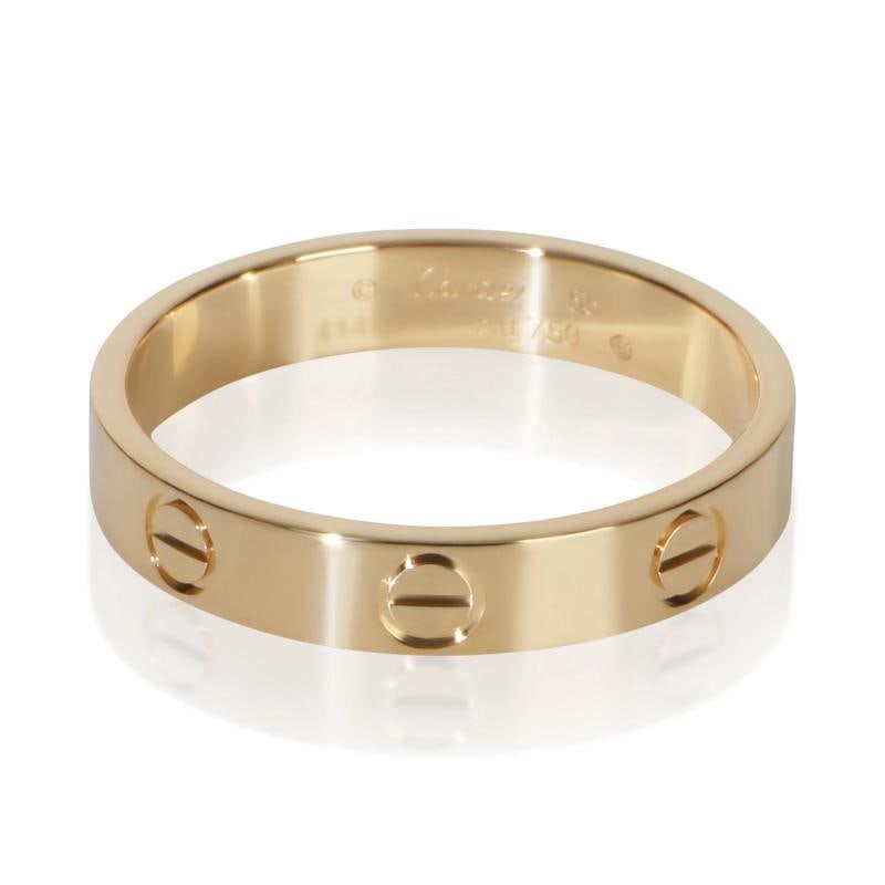 Cartier Yellow Gold Small Model Love Ring: Condition: Pre-owned,Country of Origin: France,With Original Box/Packaging: Yes,Side Stone Type: No Stone,Metal Purity: 18k,With Papers: No,Gross Weight (grams): 3.43,Department: Women's,Collection: