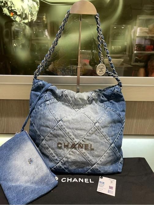 Chanel Denim Quilted Small Chanel 22 in Blue Denim (2023): Condition: Pre-owned - Excellent,Brand: CHANEL,Accessories: Pochette,Department: Women,Size: Small,Exterior Color: Blue,Model: 22,Style: Hobos,Exterior Material: Denim,Finish: Quilted,Country of