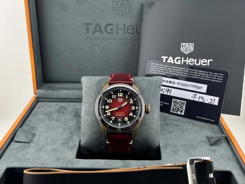 TAG Heuer Autavia Automatic WBE5192.FC8300 42mm Red Dial Bronze Box Paper: Condition: Pre-owned - Excellent,Bezel Color: Black,Indices: Arabic Numerals,Year Manufactured: 2020-Now,Band/Strap: Two-Piece Strap,Case Color: Bronze,Department: Men,Watch Shape: Round,Style: Casual