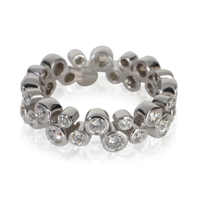 Tiffany & Co. Platinum Diamond Bubbles Band: Condition: Pre-owned - Good,Shape: Round Brilliant,With Original Box/Packaging: Yes,Side Stone Type: Diamond,Side Stone Weight (cts): 0.96,Metal Purity: 950,With Papers: No,Gross Weight (grams):