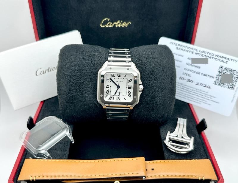 2024 Cartier Santos Medium WSSA0029 4075 35.1 mm Silver Dial Steel Box Paper: Condition: Pre-owned - Excellent,Bezel Color: Silver,Indices: Roman Numerals,Year Manufactured: 2024,Band/Strap: Bracelet,Case Color: Silver,Department: Men,Watch Shape: Square,Style: Luxury, Sport,Ca