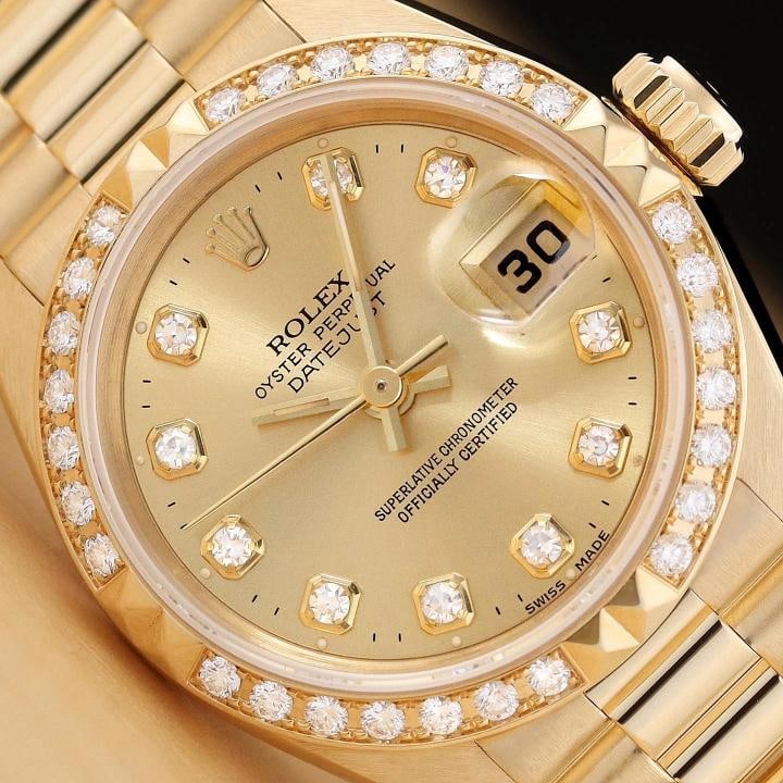 ROLEX DATEJUST PRESIDENT 69268 18K GOLD FACTORY DIAMOND DIAL PYRAMID BEZEL WATCH: This is an authentic Rolex Datejust 69268 watch with factory Rolex diamond dial, Rolex 18K yellow gold pyramid diamond bezel, Rolex 18K yellow gold president bracelet, and factory Rolex box and hang t