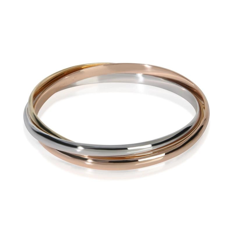 Cartier 3-Tone Gold Trinity Bracelet: Condition: Pre-owned,Item Length: 7 in,Clasp/Buckle Type: No Clasp,With Papers: Yes,Side Stone Type: No Stone,Metal Purity: 18k,With Original Box/Packaging: No,Gross Weight (grams): 58.57,Department: