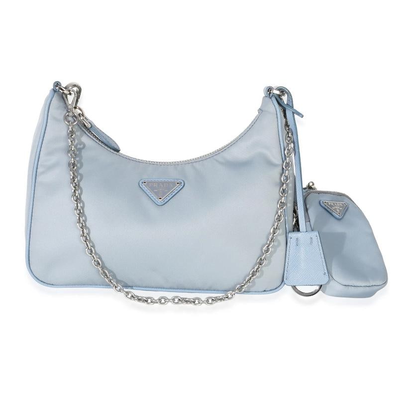 Prada Blue Nylon Saffiano Leather Re-Edition 2005: Condition: Pre-owned - Good,Dimensions: 8.75 x 5.25 x 2.25,Handbag Accessories: Dustbag;Pochette;Care Booklet;Removable Straps,Bag Width: 8.75 in,Bag Depth: 2.25 in,Bag Height: 5.25 in,Department: