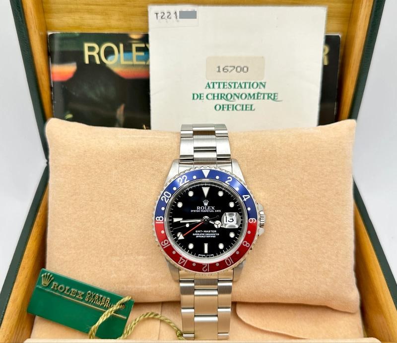 Rolex GMT Master 16700 40mm PEPSI Red and Blue Stainless Steel Box Papers: Condition: Pre-owned - Excellent,Bezel Color: Blue, Red,Year Manufactured: 1990-1999,Band/Strap: Rolex Oyster,Case Color: Silver,Department: Men,Watch Shape: Round,Style: Casual, Classic, Dress/Formal