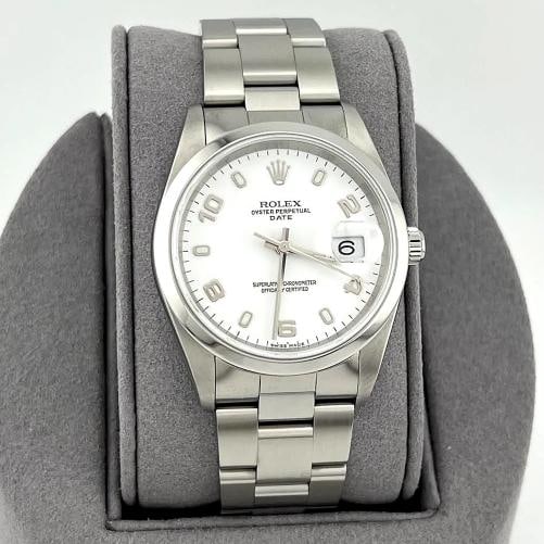 Rolex Date 15200 34mm White Arabic Numeral Dial Stainless Steel: Condition: Pre-owned - Excellent,Bezel Color: Silver,Movement: Mechanical (AutomaticIndices: Arabic Numerals,Year Manufactured: 2000-2009,Reference Number: 15200,Band/Strap: Rolex Oyster,Brand: Rolex,