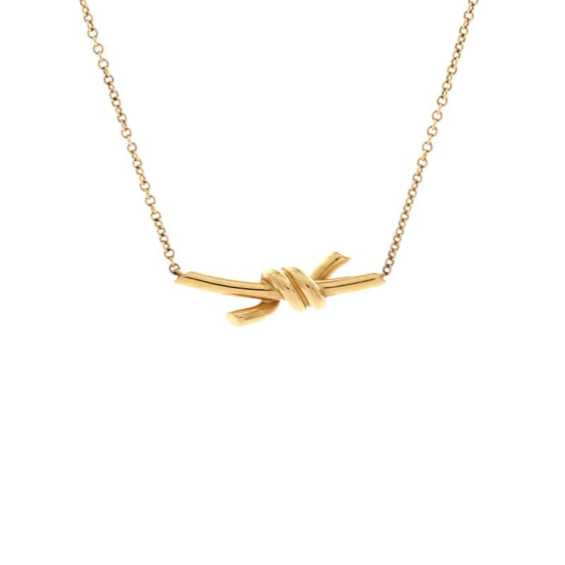 Tiffany & Co. Knot Pendant Necklace 18K Yellow Gold: Condition: Pre-owned - Good,Brand: Tiffany & Co.,Main Stone: Unknown,Metal: 18K Yellow Gold,Metal Purity: 18K,Style: Pendant,Type: Necklace,Color: Yellow Gold,Material: 18K Yellow Gold