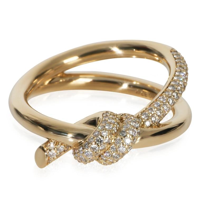 Tiffany & Co. Yellow Gold Diamond Double Row Knot Ring: Condition: Pre-owned,Shape: Round Brilliant,Country of Origin: Italy,With Original Box/Packaging: Yes,Side Stone Type: Diamond,Side Stone Weight (cts): 0.32,Metal Purity: 18k,With Papers: No,Gross