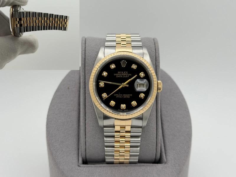 Rolex Datejust 16233 36mm Black Diamond Dial 18k Gold Stainless Steel: Condition: Pre-owned - Good,Bezel Color: Gold, Yellow,Movement: Mechanical (Automatic),,Indices: Diamond Markers,Year Manufactured: 1980-1989,Reference Number: 16233,Band/Strap: Rolex Jubilee,Brand: R
