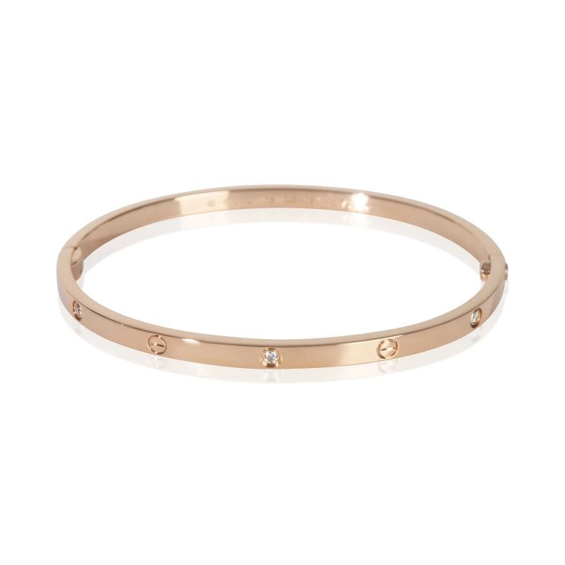 Cartier Rose Gold Diamond Small Model Love Bracelet: Condition: Pre-owned,Shape: Round Brilliant,Item Length: 18 cm,Clasp/Buckle Type: Screw,With Original Box/Packaging: Yes,With Papers: Yes,Side Stone Type: Diamond,Side Stone Weight (cts): 0.15,Metal