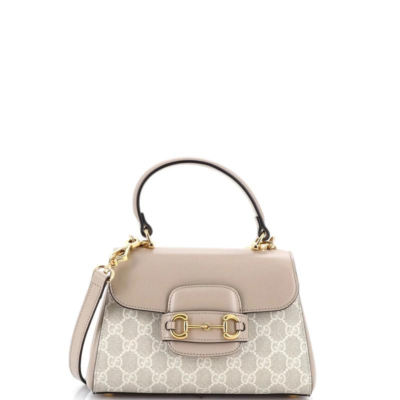 Gucci Horsebit 1955 Top Handle Flap Bag GG Coated Canvas and Leather Mini: Accessories: With Strap Measurements: Height 6", Width 8.5", Depth 5". Condition: Pre-owned - Good,Brand: Gucci,Exterior Material: Leather, Canvas Coated,Style: Top Handle,Exterior Color: Neutral,Depa