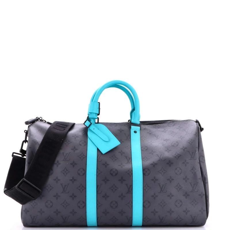 Louis Vuitton Keepall Bandouliere Bag Reverse Monogram Eclipse Canvas: Accessories: Lock, Keys, Luggage Tag, Poignet, With Strap Measurements: Height 11.5", Width 18", Depth 6". Condition: Pre-owned - Excellent,Brand: Louis Vuitton,Exterior Material: Canvas Coated, Leath