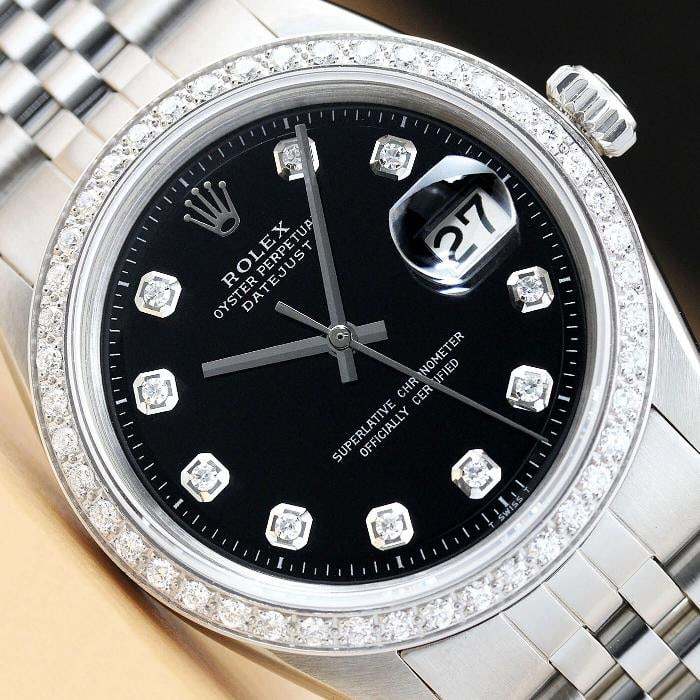 MENS ROLEX DATEJUST 1603 BLACK DIAL 18K WHITE GOLD DIAMOND STAINLESS STEEL WATCH: This is an authentic Rolex Datejust 1603 watch with Rolex stainless steel jubilee bracelet, Rolex dial Ref. with added genuine diamond markers, and custom 18K white gold diamond bezel. Descriptions: B