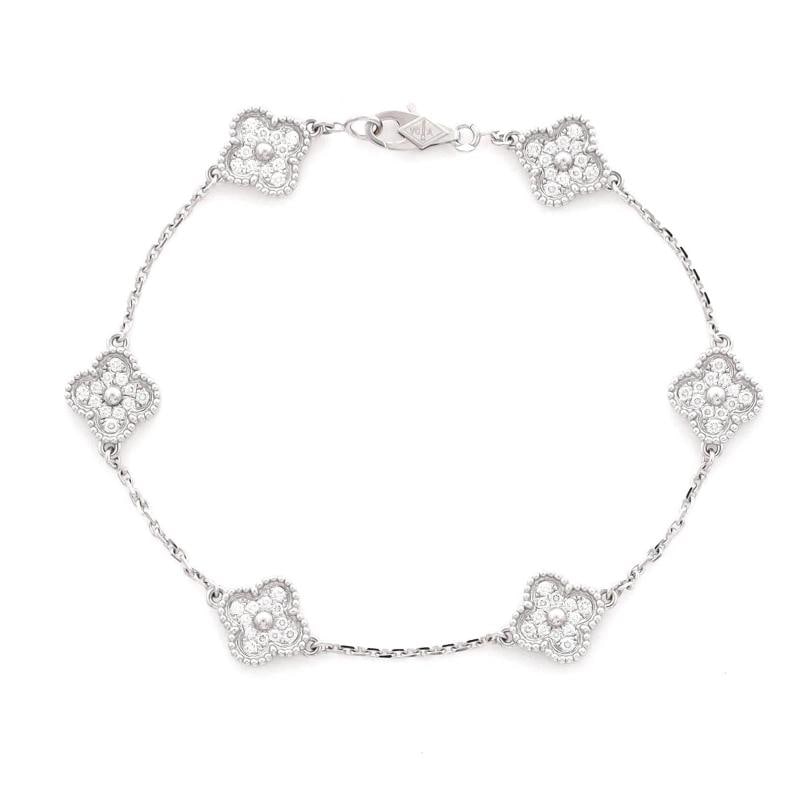 Van Cleef & Arpels Sweet Alhambra 6 Motifs Bracelet 18K White Gold and Diamonds: Measurements: Circumference: 6.25 ", Width: 9.30 mm . Condition: Pre-owned - Good,Brand: Van Cleef & Arpels,Main Stone: Diamond,Metal: 18K White Gold,Metal Purity: 18K,Style: Bracelet,Type: