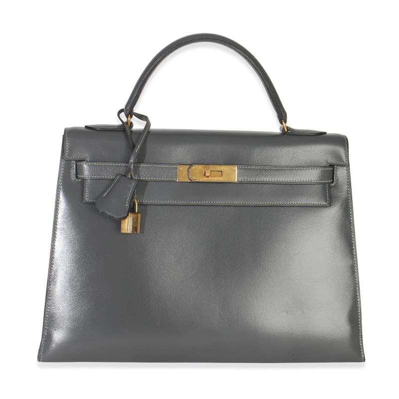 HermÃƒÂ¨s Ardoise Box Sellier Kelly 32 GHW: Condition: Pre-owned - Good,Country of Origin: France,Dimensions: 12.5 x 9 x 4.25,Handbag Accessories: Clochette;Dustbag;Lock;Key,Bag Width: 12.5 in,Bag Depth: 4.25 in,Bag Height: 9 in,Department: