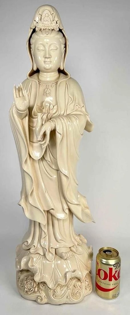 HUGE 29" Antique Chinese Dehua Blanc de Chine Kwan Yin Guanyin Porcelain Statue: monumental antique statue of the goddess of mercy Guanyin, originating from China, early 20th century. The statue comes from the Dehua area in China, noted for its Blanc de Chine white porcelain wares
