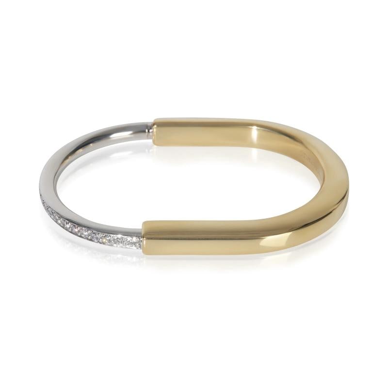 Tiffany & Co. White Gold & Yellow Gold Diamond Lock Bracelet, Size Small: Condition: Pre-owned - Good,Shape: Round Brilliant,Item Length: 6.25 in,Clasp/Buckle Type: Pusher,With Original Box/Packaging: Yes,Side Stone Type: Diamond,Side Stone Weight (cts): 1.08,Metal Purity: