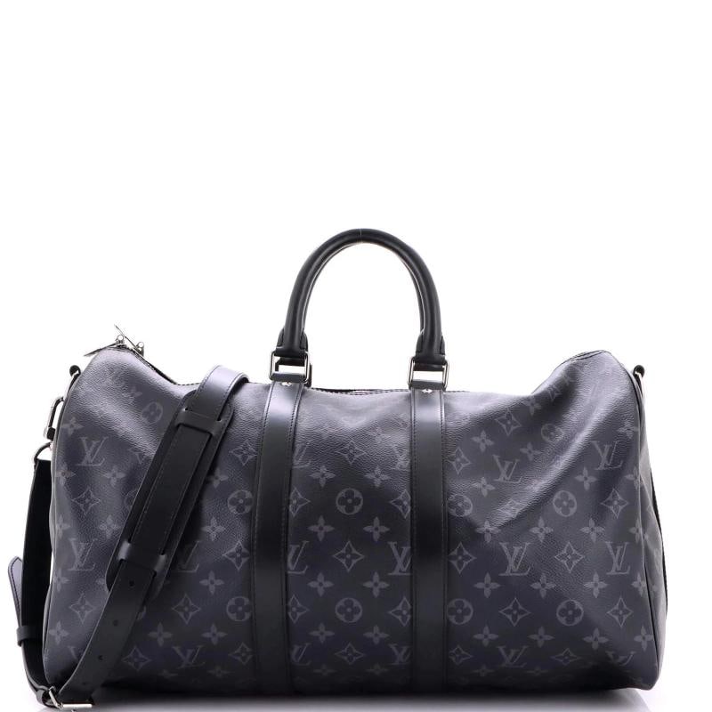 Louis Vuitton Keepall Bandouliere Bag Monogram Eclipse Canvas 45: Accessories: With Strap Measurements: Handle Drop 4.5", Height 11", Width 17.5", Depth 8", Strap Drop 16-20". Condition: Pre-owned - Good,Brand: Louis Vuitton,Exterior Material: Canvas Coated,Style: D