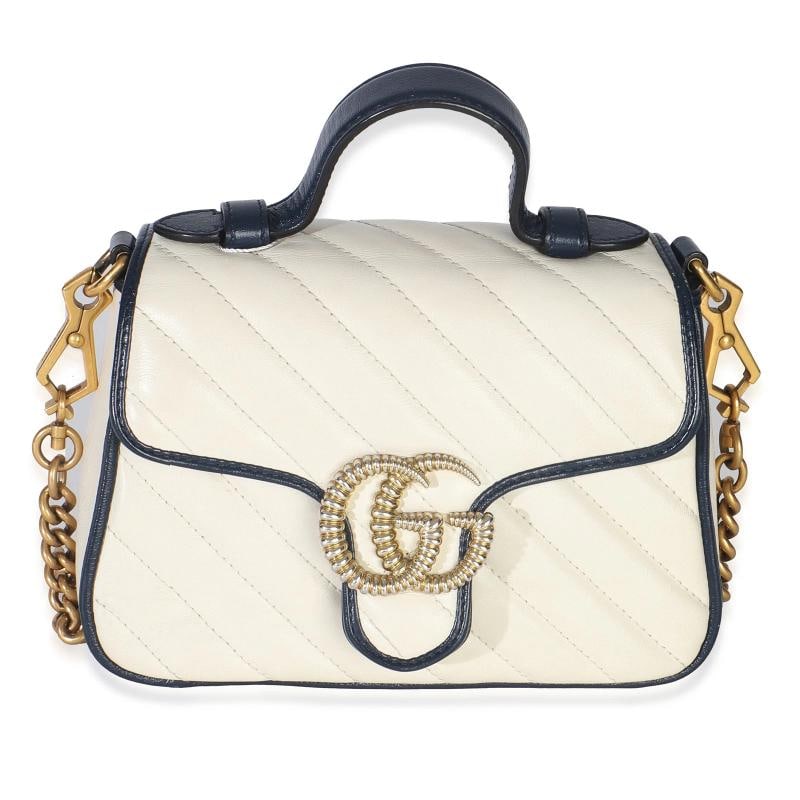 Gucci Navy White Calfskin Matelasse Diagonal Torchon Mini GG Marmont Top Handle: Condition: Pre-owned - Good,Country of Origin: Italy,Dimensions: 8.25 x 5.5 x 3,Handbag Accessories: None,Bag Width: 8.25 in,Bag Depth: 3 in,Bag Height: 5.5 in,Department: Unisex,Style: Crossbody Bag;