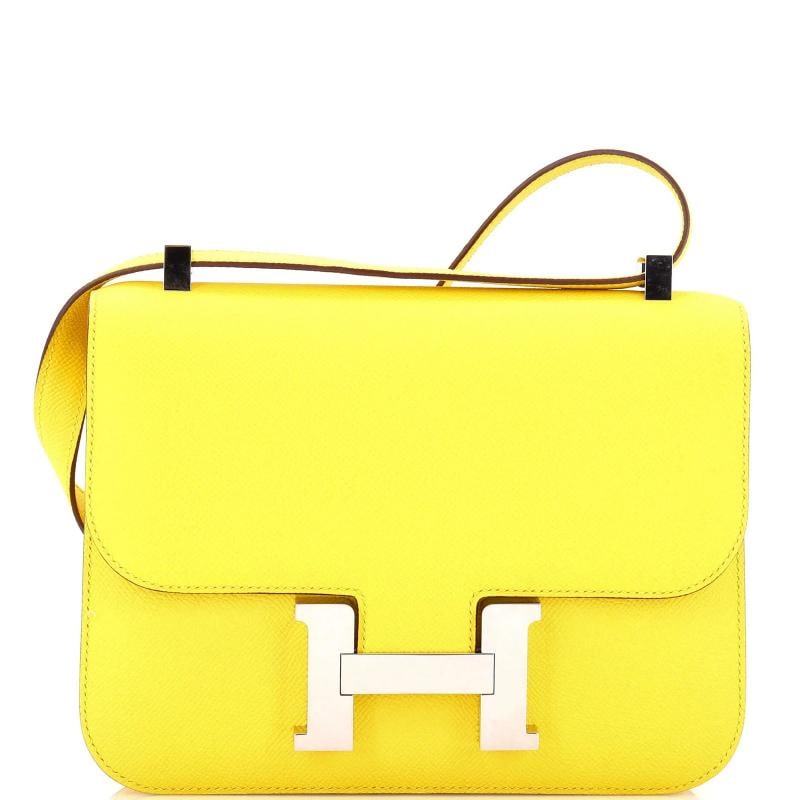 Hermes Constance NM Bag Epsom 24: Condition: Pre-owned - Excellent,Brand: Hermes,Exterior Material: Leather,Style: Shoulder Bags,Exterior Color: Yellow,Department: Women,Size: 24,Accessories: Dust Bag, Mirror Condition: Excellent. Int