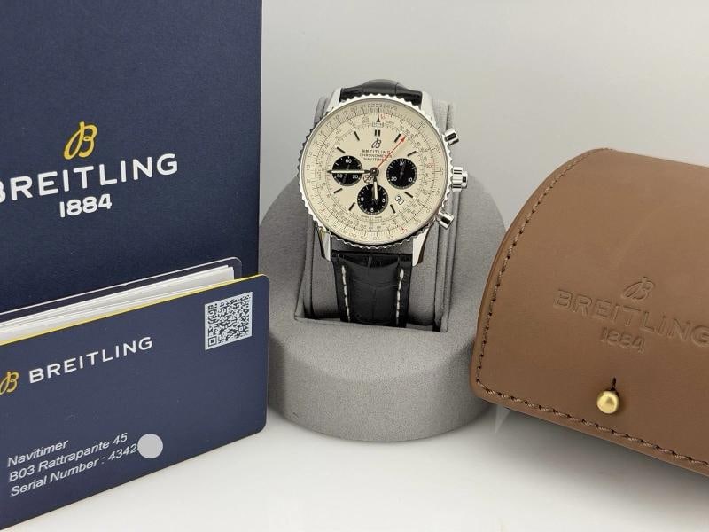 Breitling Navitimer Rattrapante B03 AB0311 45mm Silver Dial Steel Box Papers: Style Number: AB0311 Model: Breitling Navitimer Rattrapante B03 Case Material: Stainless Steel Band: Black Leather Bezel: Stainless Steel Dial: Silver Crystal: Sapphire Case Size: 45mm Includes: -Brei