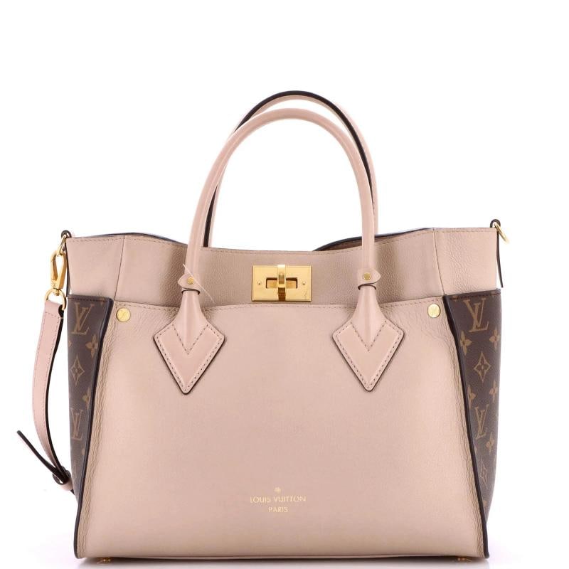 Louis Vuitton On My Side Tote Leather with Monogram Canvas MM: Accessories: With Strap Measurements: Handle Drop 4.5", Height 9.5", Width 12", Depth 5", Strap Drop 17-19". Condition: Pre-owned - Good,Brand: Louis Vuitton,Exterior Material: Canvas Coated,