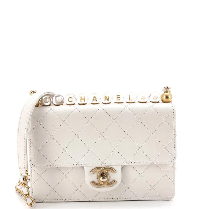 Chanel Chic Pearls Flap Bag Quilted Goatskin with Acrylic Beads Small: Measurements: Height 6", Width 7.5", Depth 2", Strap Drop 22" . Condition: Pre-owned - Good,Brand: Chanel,Exterior Material: Leather,Style: Shoulder Bags,Exterior Color: White,Department: Women,Size: