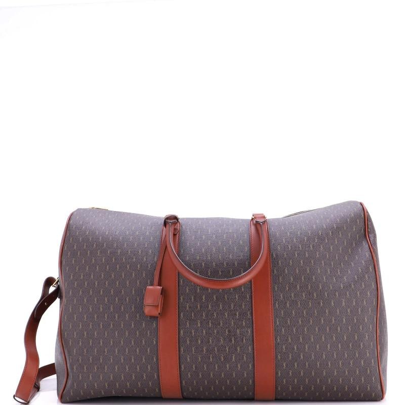 Saint Laurent Le Monogramme Duffle Bag Monogram All Over Coated Canvas: Accessories: Keys, Detachable Strap, Lock, Clochette Measurements: Handle Drop 7", Height 17", Width 22.5", Depth 10", Strap Drop 15". Condition: Pre-owned - Excellent,Brand: Saint Laurent,Exterior