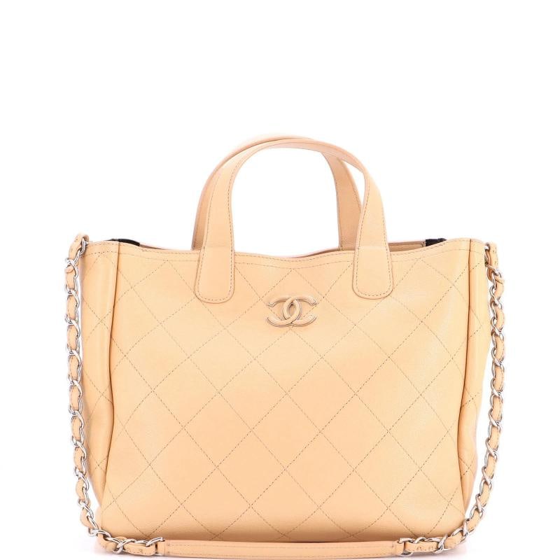 Chanel Covered CC Shopping Tote Stitched Caviar Medium: Accessories: Authenticity Card, Dust Bag Measurements: Handle Drop 4", Height 10", Width 11.5", Depth 5", Strap Drop 15". Condition: Pre-owned - Good,Brand: Chanel,Exterior Material: Leather,Style: