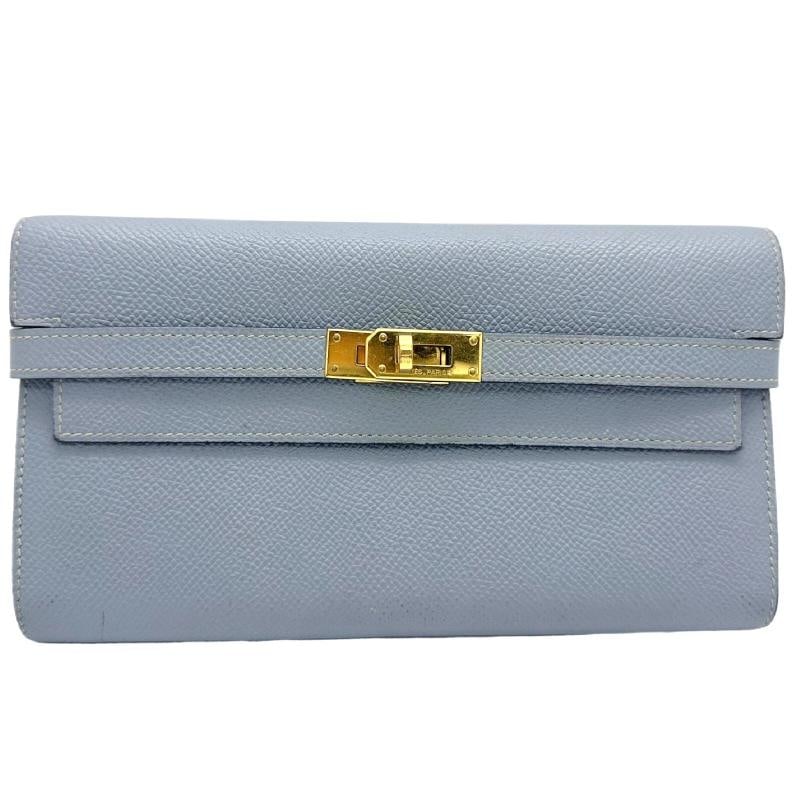 HERMES Epson Kelly Longue Wallet in Blue Lin: Condition: Pre-owned - Good: This item has been gently used but is in good condition. It might have a few signs of use, but all imperfections should be shown and described in the