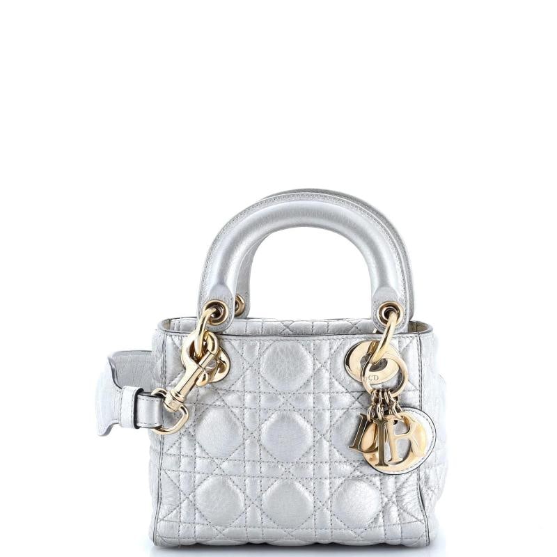Christian Dior Supple Lady Dior Bag Cannage Quilt Calfskin Mini: Condition: Pre-owned - Good,Brand: Christian Dior,Exterior Material: Leather,Style: Top Handle,Exterior Color: Silver,Department: Women,Size: Mini,Accessories: With Strap Estimated Retail Price: $3,50