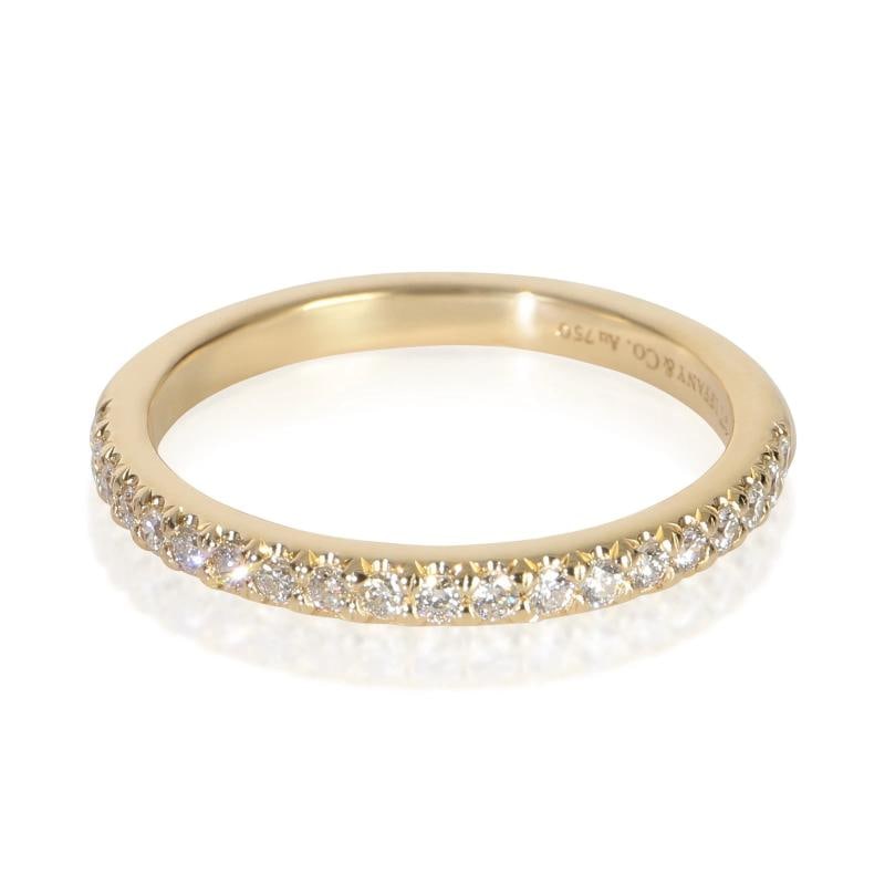 Tiffany & Co. Yellow Gold Diamond Soleste Band: Condition: Pre-owned - Good,Shape: Round Brilliant,With Original Box/Packaging: Yes,Side Stone Type: Diamond,Side Stone Weight (cts): 0.17,Metal Purity: 18k,With Papers: No,Gross Weight (grams):