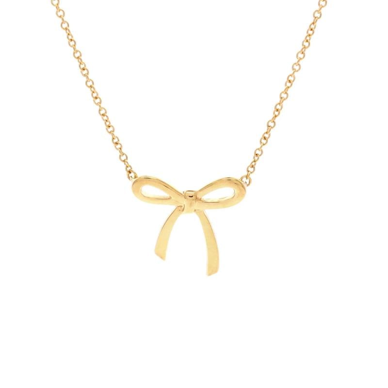 Tiffany & Co. Bow Pendant Necklace 18K Yellow Gold Mini: Condition: Pre-owned,Style: Pendant,Brand: Tiffany & Co.,Type: Necklace,Color: Yellow Gold,Metal: 18K Yellow Gold,Main Stone: Unknown,Material: 18K Yellow Gold,Metal Purity: 18K