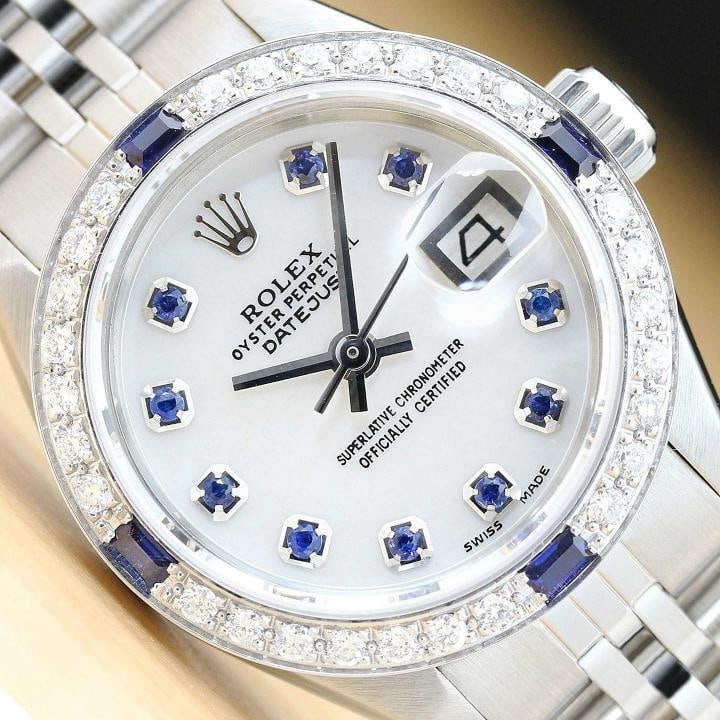 ROLEX LADIES DATEJUST 6919 MOTHER OF PEARL SAPPHIRE DIAMOND 18K GOLD SS WATCH: Condition: Pre-owned - Excellent,Bezel Color: Silver,Max Wrist Size: 6.26-6.75 in,Number of Jewels: 28 Jewels,Dial Pattern: Mother of Pearl,Indices: Sapphire Markers,Band: Rolex Stainless Steel Jubile