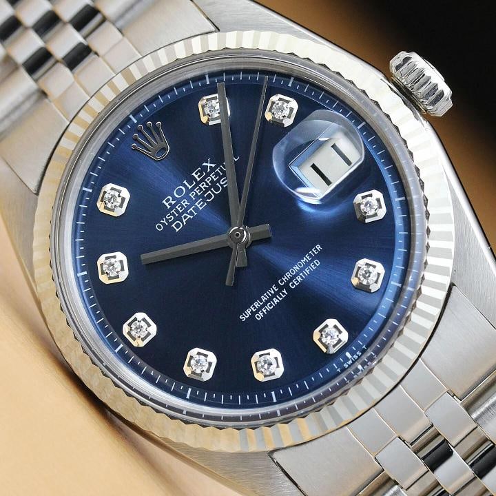 ROLEX MENS DATEJUST 1601 BLUE DIAMOND 18K WHITE GOLD BEZEL WATCH w/ ROLEX BAND: Condition: Pre-owned - Excellent,Bezel Color: Silver,Max Wrist Size: 7.26-7.5 in,Number of Jewels: 26 Jewels,Indices: Diamond Markers, 12-Hour Dial, Multiple Hands,Bezel: Rolex 18K White Gold Fluted