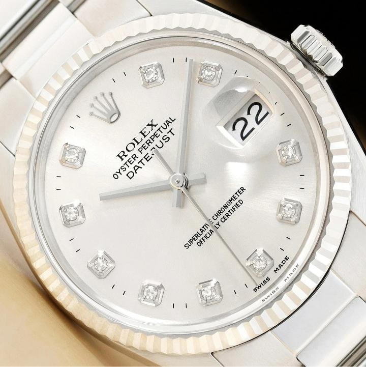 MENS ROLEX DATEJUST 16014 18K WHITE GOLD STAINLESS STEEL SILVER DIAMOND WATCH: Condition: Pre-owned - Excellent,Bezel Color: Silver,Max Wrist Size: 7.26-7.5 in,Number of Jewels: 27 Jewels,Indices: Diamond Hour Marks, 12-Hour Dial,Bezel: Rolex 18K White Gold Fluted