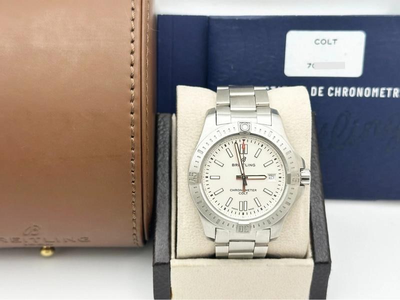 Breitling Colt A17313 41mm Stainless Steel Box Paper: Condition: Pre-owned - Good,Country of Origin: Switzerland,Bezel Color: Silver,Year Manufactured: 2010-2019,Band/Strap: Bracelet,Case Color: Silver,Caseback: Solid,Department: Men,Watch Shape: Round,S